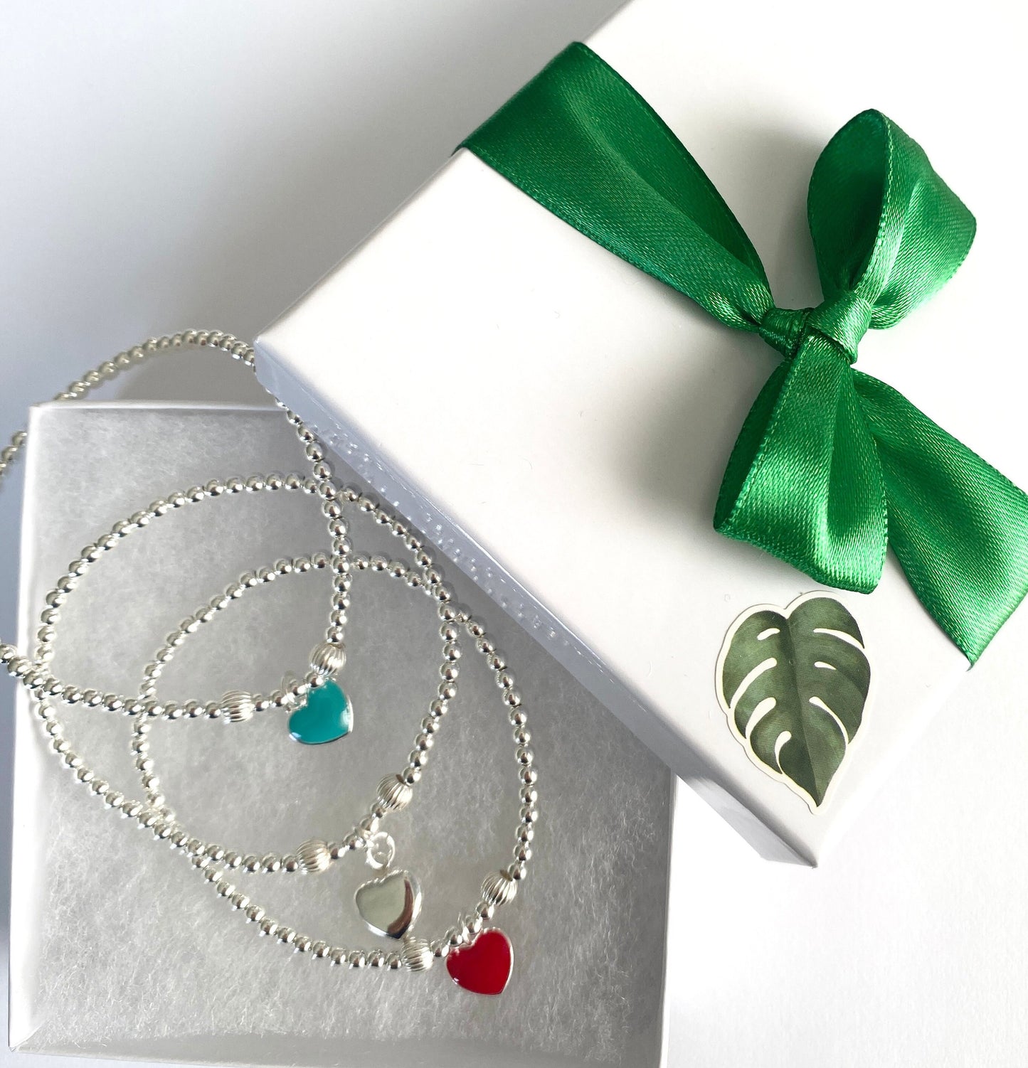 Sterling Silver Charm Bracelet with Red and Blue Heart Charms