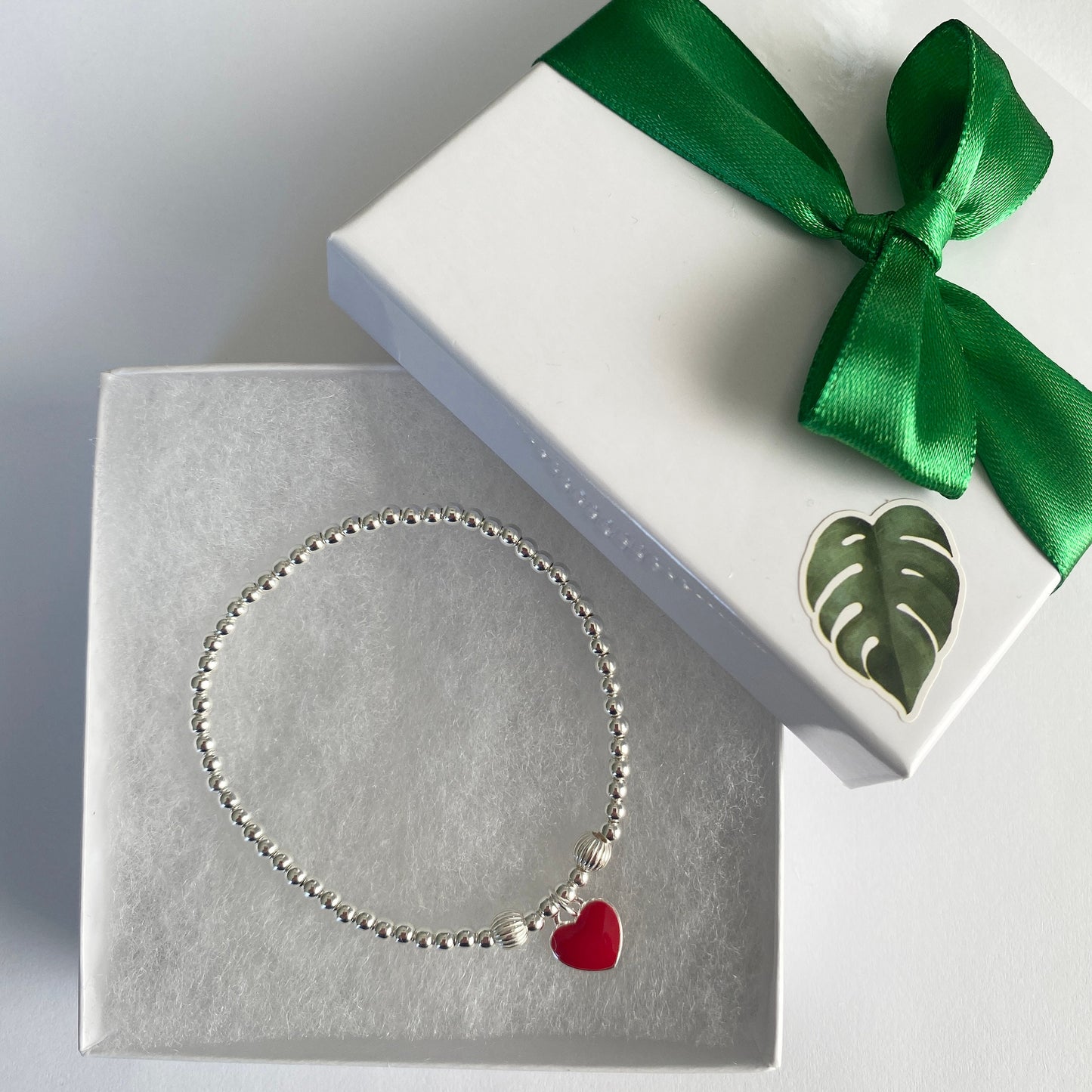 Sterling Silver Charm Bracelet with Red and Blue Heart Charms