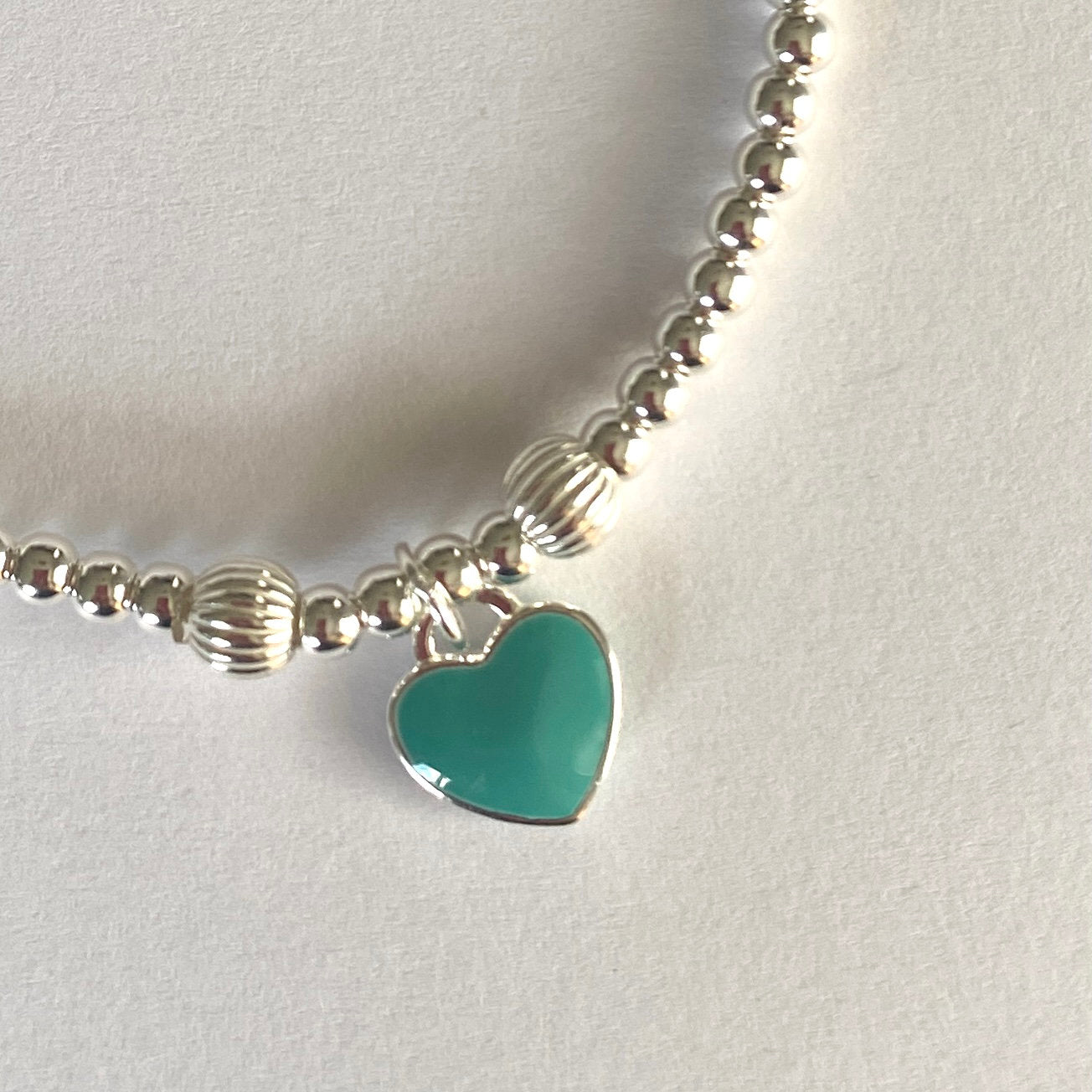 Sterling Silver Charm Bracelet with Red and Blue Heart Charms