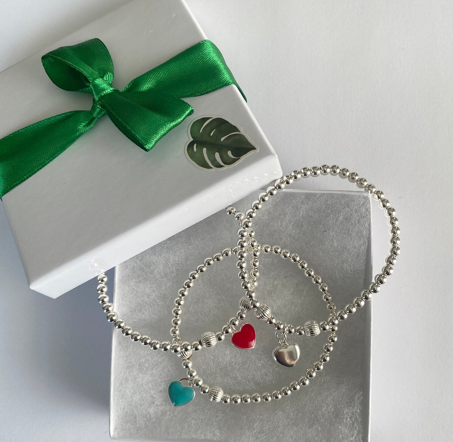 Sterling Silver Charm Bracelet with Red and Blue Heart Charms