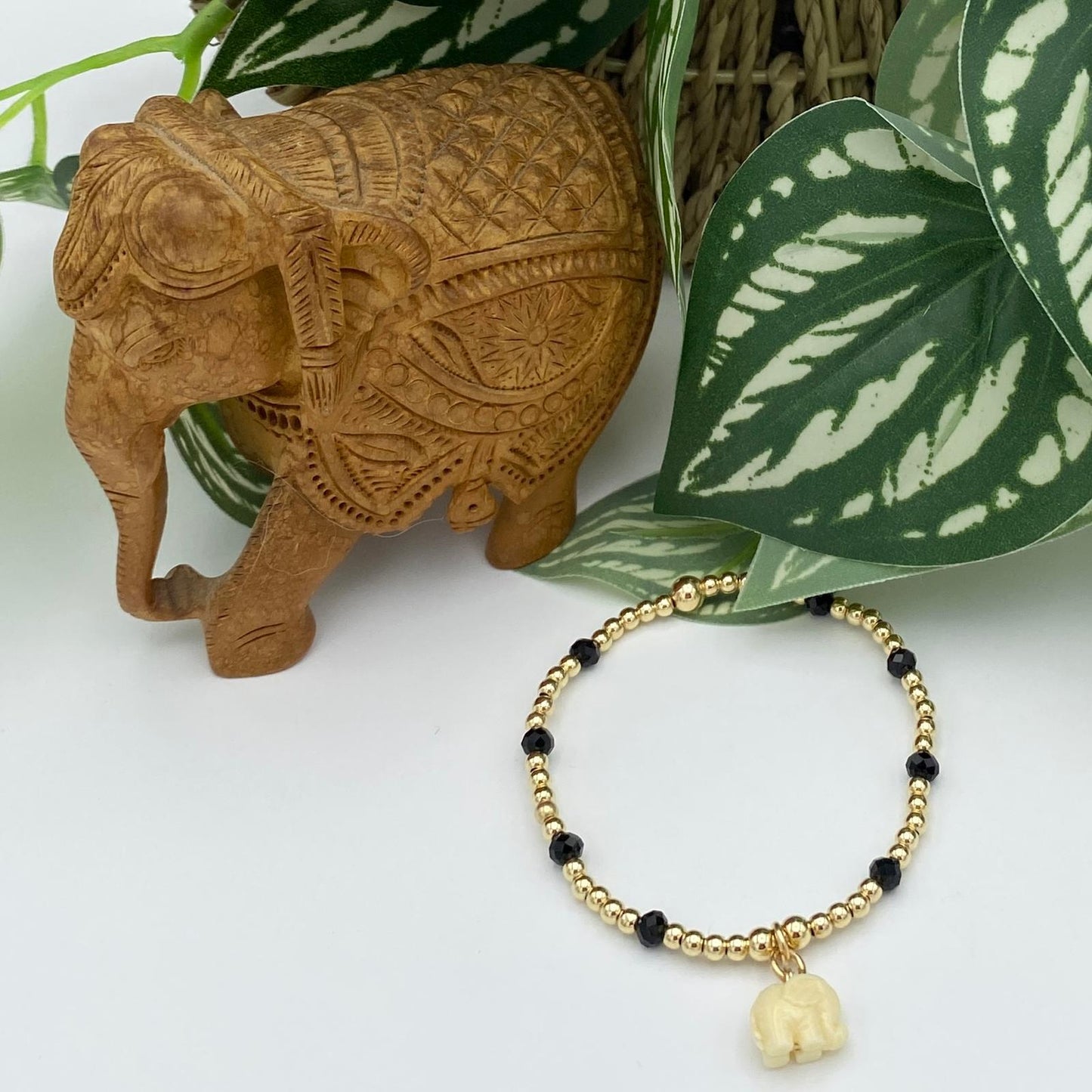 Gold filled spring charm bracelet nature inspired flower and elephant jewelry gift for women